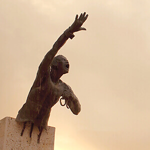 A sculpture of an escaped African slave